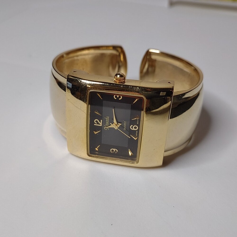 Small 5.5 Inch Xanadu Gold Tone Cuff Watch